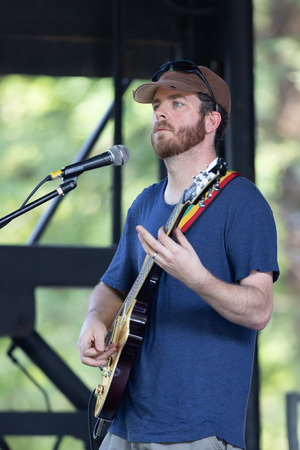St. Louis, Missouri, USA - August 26, 2018: The Festival of Nations, Man playing the electric guitarのeditorial素材