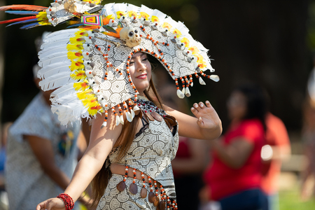 Washington, D.C., USA - September 29, 2018: The Fiesta DC Parade, peruvian woman wearing traditional clothing danicng during the paradeのeditorial素材