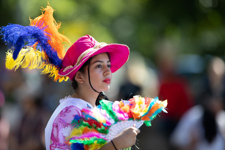 Washington, D.C., USA - September 29, 2018: The Fiesta DC Parade, Woman wearing traditional clothing...