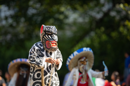 Washington, D.C., USA - September 29, 2018: The Fiesta DC Parade, Mexican man dress up as a jaguarのeditorial素材