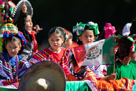 Washington, D.C., USA - September 29, 2018: The Fiesta DC Parade, Mexican children on top of a float wearing traditional mexican clothingのeditorial素材