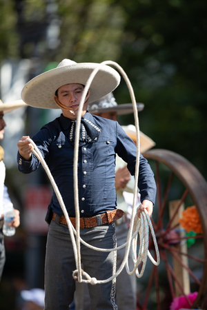 Washington, D.C., USA - September 29, 2018: The Fiesta DC Parade, Mexican man dress up as a charro handling a lassoのeditorial素材