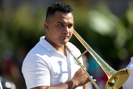 Washington, D.C., USA - September 29, 2018: The Fiesta DC Parade, Member of The Salvadorian Band with a trumpetのeditorial素材