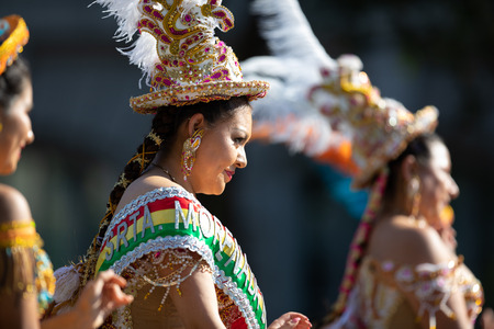 Washington, D.C., USA - September 29, 2018: The Fiesta DC Parade, Bolivian women wearing traditional clothing performing a traditional dance from boliviaのeditorial素材
