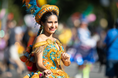 Washington, D.C., USA - September 29, 2018: The Fiesta DC Parade, Bolivian women wearing traditional clothing performing a traditional dance from boliviaのeditorial素材