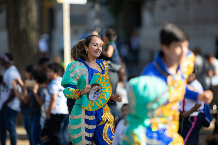 Washington, D.C., USA - September 29, 2018: The Fiesta DC Parade, Bolivian women wearing traditional...