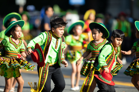 Washington, D.C., USA - September 29, 2018: The Fiesta DC Parade, children from bolivia wearing traditional clothing dancingのeditorial素材