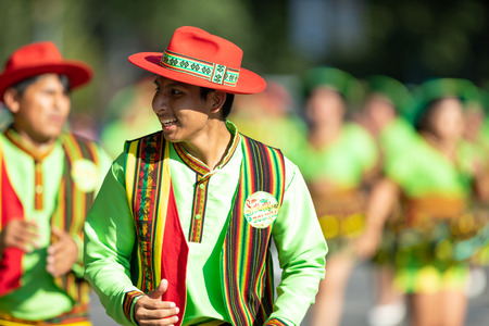 Washington, D.C., USA - September 29, 2018: The Fiesta DC Parade, Bolivian men wearing traditional...