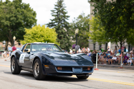 Auburn, Indiana, USA - September 9, 2018 The Auburn Cord Duesenberg Festival, A Corvette classic car driving down the street during the paradeのeditorial素材