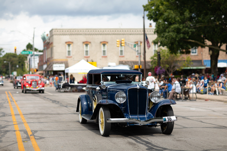 Auburn, Indiana, USA - September 9, 2018 The Auburn Cord Duesenberg Festival, An Auburn classic car driving down the street during the paradeのeditorial素材