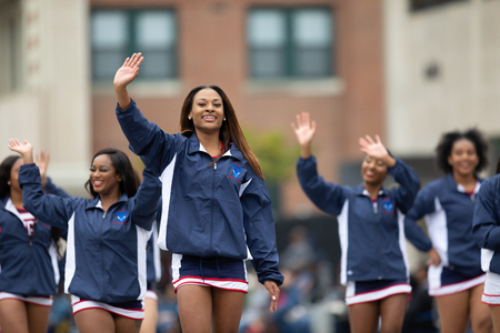 Indianapolis, Indiana, USA - September 22, 2018: The Circle City Classic Parade, African american cheerleader from Howard University Bison Cheerleading walking down the street paradeのeditorial素材