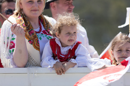 Chicago, Illinois, USA - May 5, 2018: The Polish Constitution Day Parade, polish girl on a float wearing traditional clothing going down the streetのeditorial素材
