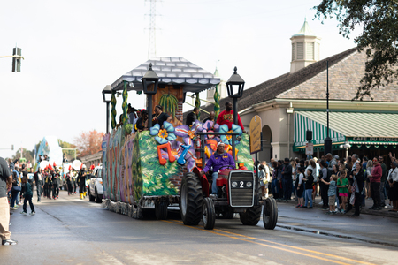 New Orleans, Louisiana USA - November 24, 2018: The Bayou Classic Parade, A float pulled by a tractor carrying the Grambling State University Bayou Classic Commitee at the paradeのeditorial素材