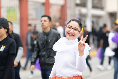 Matamoros, Tamaulipas, Mexico - November 20, 2018: The November 20 Parade, Young Mexican woman wearing traditional mexican clothing going down the road during the paradeのeditorial素材