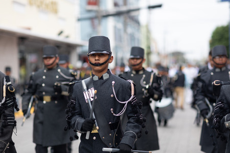 Matamoros, Tamaulipas, Mexico - November 20, 2018: The November 20 Parade, Marching Band with military Style uniform performing at the paradeのeditorial素材