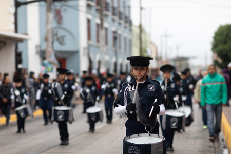 Matamoros, Tamaulipas, Mexico - November 20, 2018: The November 20 Parade, Marching Band with military Style uniform performing at the paradeのeditorial素材