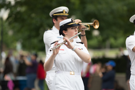 Washington, D.C., USA - May 28, 2018: The National Memorial Day Parade, United States Navy members marching down constitution avenue during the paradeのeditorial素材