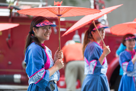 Washington, D.C., USA - July 4, 2018, The National Independence Day Parade, Taiwanese women wearing traditional clothing, walking down constitution avenue during the paradeのeditorial素材