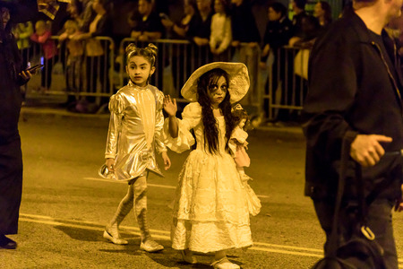 Chicago, Illinois, USA - October 21, 2017: The Arts in the Dark, The Halloween Parade, People wearing colorfull outfits walking down Columbus Street.のeditorial素材