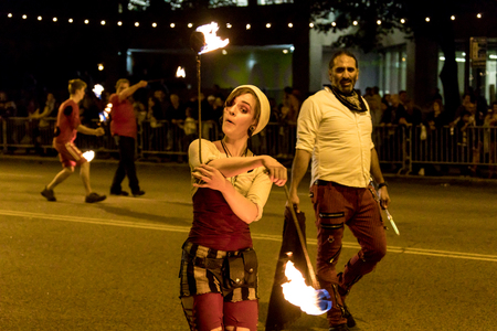 Chicago, Illinois, USA - October 21, 2017: The Arts in the Dark, The Halloween Parade, People wearing colorfull outfits walking down Columbus Street.のeditorial素材