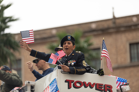 Houston, Texas, USA - November 11, 2018: The American Heroes Parade, A Pierce, Enforcer, fire truck, transporting military veterans during the paradeのeditorial素材
