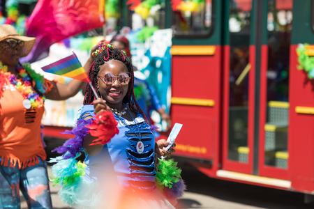 Chicago, Illinois, USA - June 24, 2018: the LGBTQ Pride Parade, People wearing colorfull outfits,...