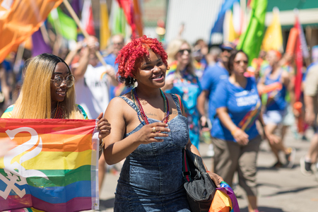 Chicago, Illinois, USA - June 24, 2018: the LGBTQ Pride Parade, People wearing colorfull outfits, celebrating on the streets of Chicagoのeditorial素材