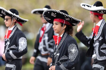 Wilmington, North Carolina, USA - April 6, 2019: The North Carolina
Azalea Festival, People of diferent cultures wearing traditional clothing going down 3rd street during the paradeのeditorial素材