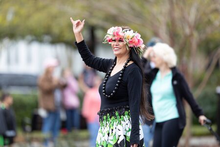 Wilmington, North Carolina, USA - April 6, 2019: The North CarolinaAzalea Festival, People of diferent cultures wearing traditional clothing going down 3rd street during the paradeのeditorial素材