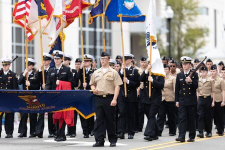 Wilmington, North Carolina, USA - April 6, 2019: The North CarolinaAzalea Festival, Members of the Eugene Ashley High School NJROTC Screaming Eagles, marching down 3rd Streetのeditorial素材