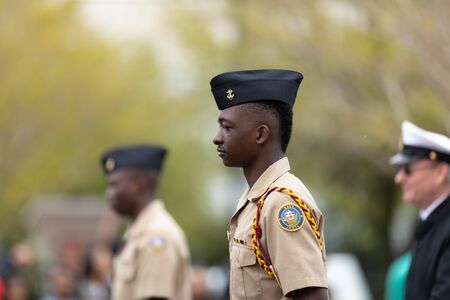 Wilmington, North Carolina, USA - April 6, 2019: The North CarolinaAzalea Festival, Members of the Eugene Ashley High School NJROTC Screaming Eagles, marching down 3rd Streetのeditorial素材