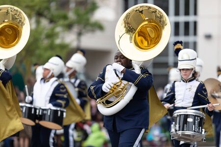 Wilmington, North Carolina, USA - April 6, 2019: The North Carolina
Azalea Festival, Members of the North Brunswick High School Marching Scorps, perform during the paradeのeditorial素材