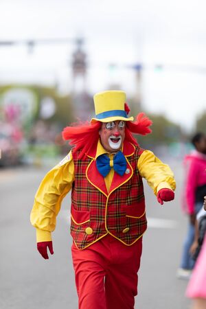 Wilmington, North Carolina, USA - April 6, 2019: The North Carolina
Azalea Festival, Members of the Dunn Clowns Sudan Shriners, going down 3rd street at the paradeのeditorial素材
