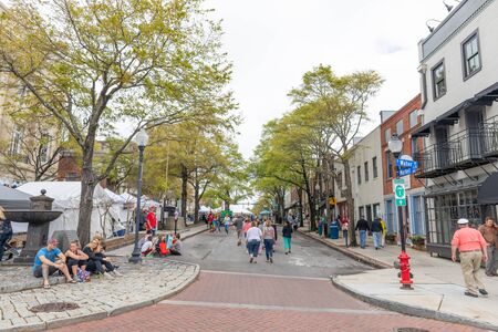 Wilmington, North Carolina, USA - April 6, 2019: The North CarolinaAzalea Festival, the street of downtown Wilmington crowded with festival goers during the Azalea Festivalのeditorial素材
