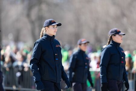 Chicago, Illinois, USA - March 16, 2019: St. Patrick's Day Parade, Members of the Civil Defence Ireland marching down Columbus driveのeditorial素材