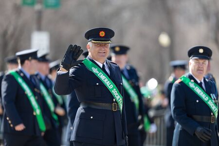 Chicago, Illinois, USA - March 16, 2019: St. Patrick's Day Parade, Police Officers members of...