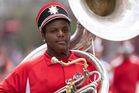New Orleans, Louisiana, USA - February 23, 2019: Mardi Gras Parade, The Abramson Sci Academy,...