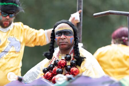 New Orleans, Louisiana, USA - February 23, 2019: Mardi Gras Parade, Man wearing traditional mardi gras clothing at the paradeのeditorial素材