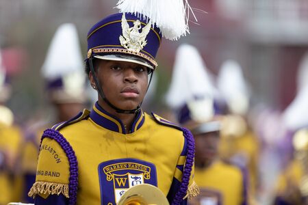 New Orleans, Louisiana, USA - February 23, 2019: Mardi Gras Parade, The Warren Eastos Charter High...