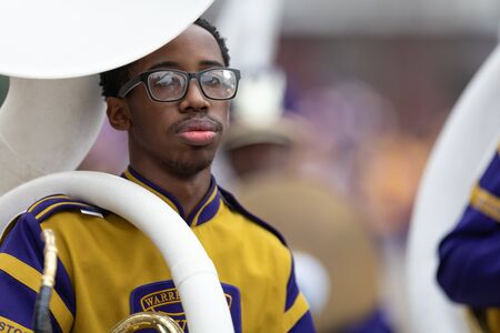 New Orleans, Louisiana, USA - February 23, 2019: Mardi Gras Parade, The Warren Eastos Charter High School Marching Band, performing at the paradeのeditorial素材