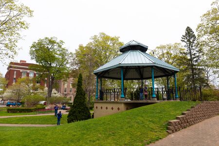 Holland, Michigan, USA - May 11, 2019: The Centennial Park, with locals and tourists, admiring the tulip flowers, during the tulip time festivalのeditorial素材