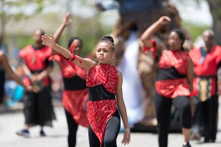 Cleveland, Ohio, USA - June 8, 2019: Parade the Circle, african american women and children wearing african style clothing dancingのeditorial素材