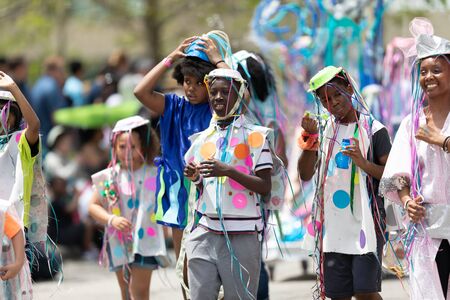 Cleveland, Ohio, USA - June 8, 2019: Parade the Circle, african american boy wearing a hat with...