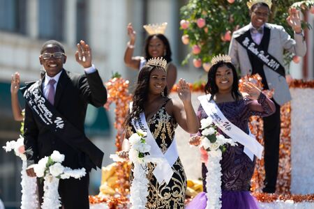 Benton Harbor, Michigan, USA - May 4, 2019: Blossomtime Festival Grand Floral Parade, Float carrying Benton Harbors queen and her courtのeditorial素材