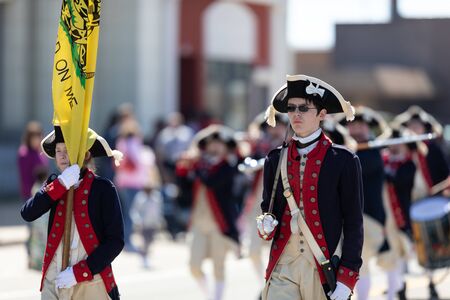 Benton Harbor, Michigan, USA - May 4, 2019: Blossomtime Festival Grand Floral Parade, Young men...