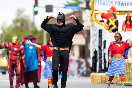 Louisville, Kentucky, USA - May 2, 2019: The Pegasus Parade, People with a float, dress up as superhero chatacters during the paradeのeditorial素材
