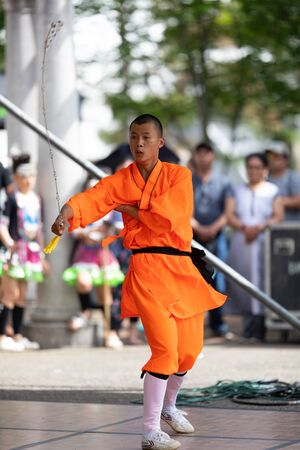 Columbus, Ohio, USA - May 26, 2019: Columbus Asian Festival, Chinese Men and women performing a display of shaolin martial arts in the amphitheater at Franklin Parkのeditorial素材