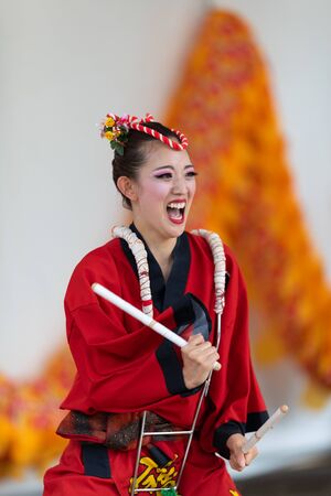 Columbus, Ohio, USA - May 26, 2019: Columbus Asian Festival, Members of Takarabune dance group from Japan, wearing traditional clothing performing traditional dances at the Amphitheater in the Franklin Park.のeditorial素材