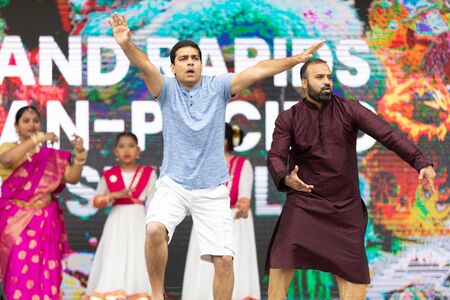 Grand Rapids, Michigan, USA - June 15, 2019: Asian Pacific Festival, Indian dancers wearing...