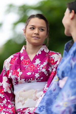 Grand Rapids, Michigan, USA - June 15, 2019: Asian Pacific Festival, japanese woman wearing traditional clothing at a fashion display  in the Rosa Parks Circleのeditorial素材